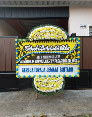 Papan Bunga Duka di Sarudik